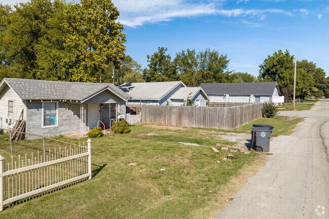 Many of the homes in Dawson have wooden fencing surrounding the property.