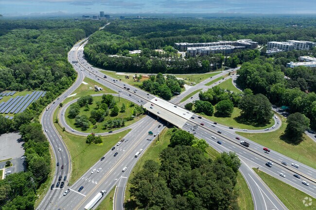 I-440 and Glenwood Ave. intersect at Crabtree Valley Mall and Midtown is seen in the distance.