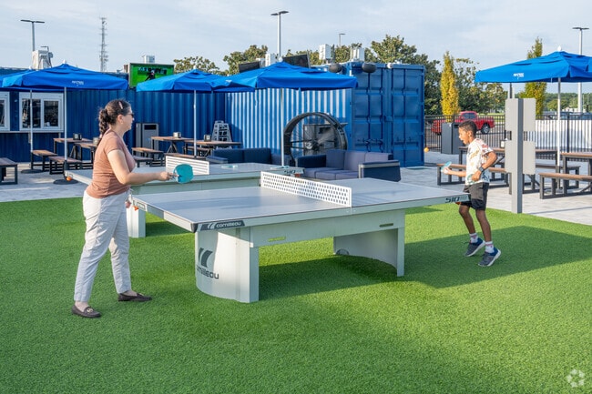 Play games with family at Pop Stroke in Greater Alberta.
