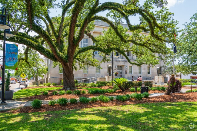 The Terrebonne Parish Courthouse near South Side is surrounded by Louisiana's large oak trees.