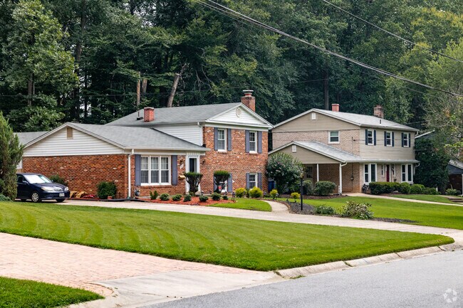 Row of charming split level homes located directly next to Georgian Forest park in Glenmont.
