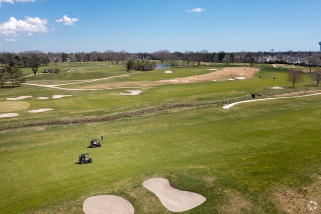 Garden City Country Club golfers enjoying a day in the sun in Stewart Manor.