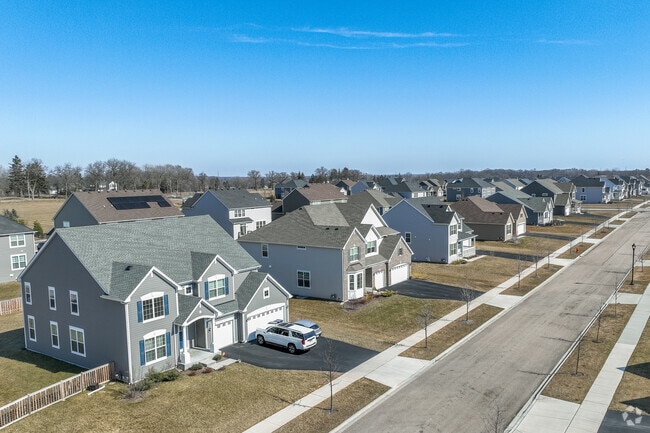 Rows of newly constructed homes with attached garages are found all over the Campton Hills area.