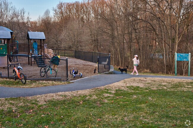 Washington Woods Park provides a wooded trail and playground for local residents to enjoy.