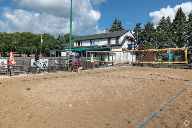 Coach’s Pub ’N’ Grill has a beach volley ball court.