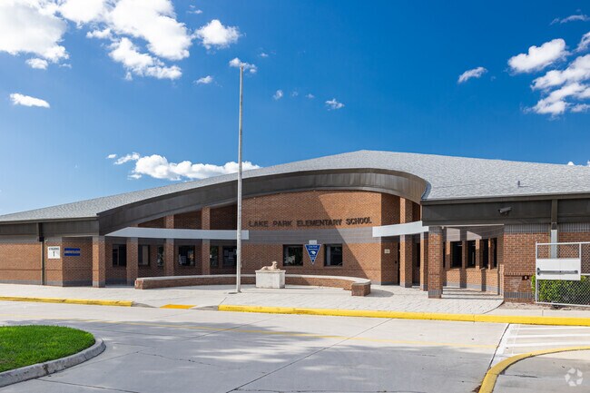 Lake Park Elementary School has a central front entrance and drop-off area.