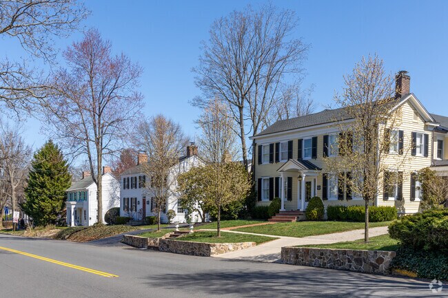 Rows of colonial homes are located on tree lined streets in Cranbury.