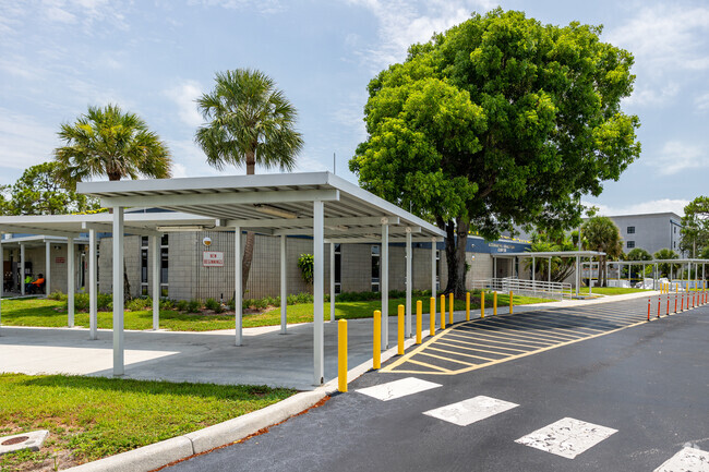 Beacon High School in Naples has covered walkways and a designated drop-off area.