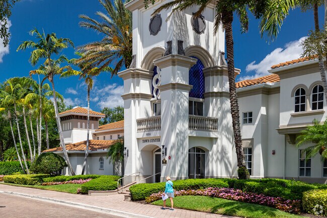 The Island Walk Town Center features restaurants, amenities, a post office, and gas station.