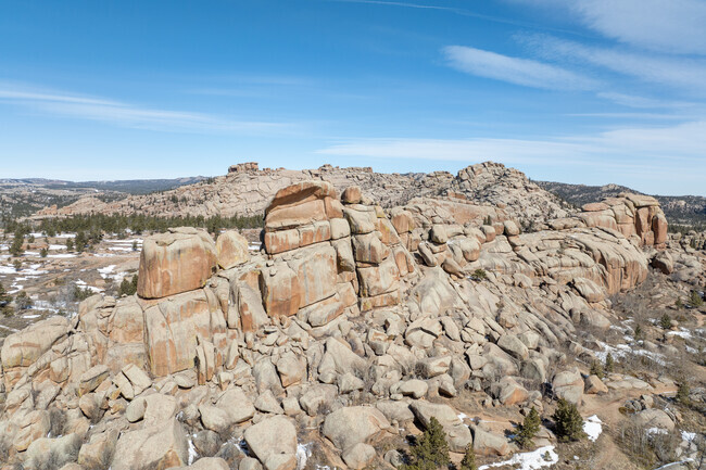 Vedauwoo’s unique rock formations near Laramie offer top climbing and scenic hiking trails.