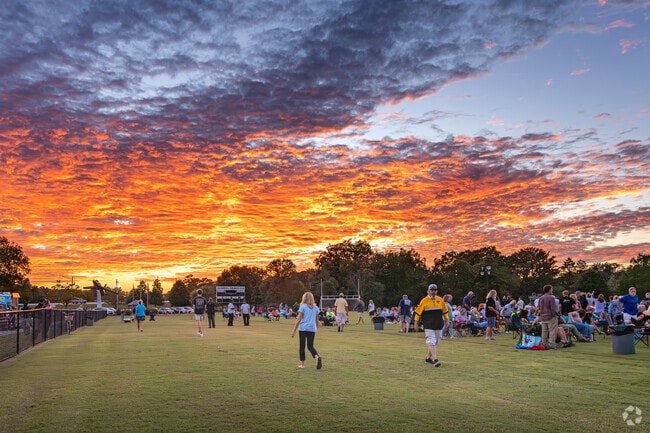 Sunsets create a scenic backdrop for New Bern’s Footloose on the Neuse concert.