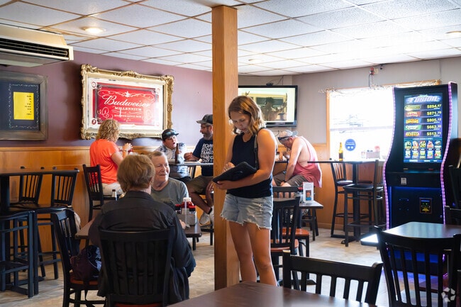 Harm’s Way Bar and Grill serves lunch and dinner on Main Street.