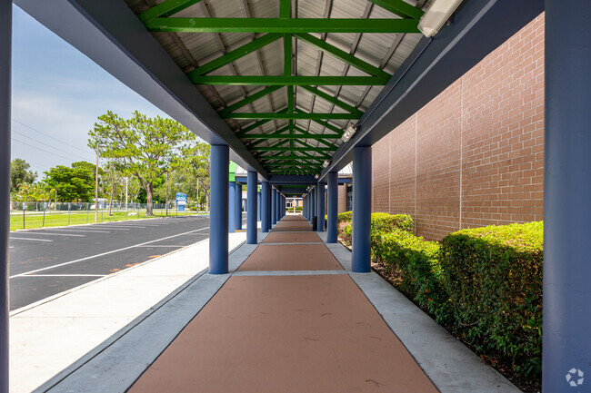 East Naples Middle School features covered walkways and waiting areas.
