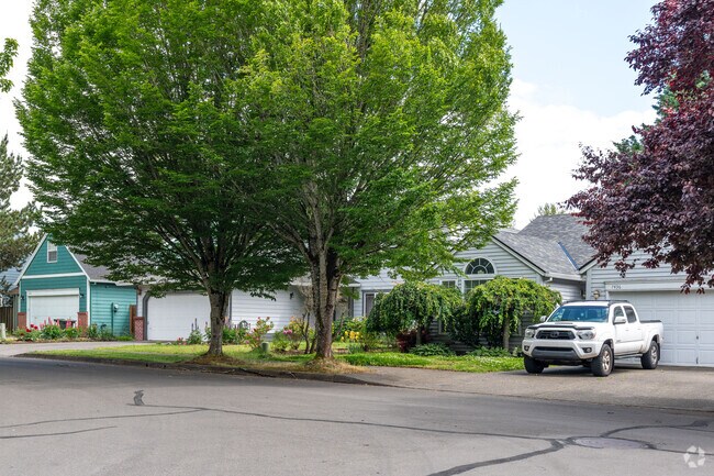 Large green trees decorate the lawns of many homes in Southeast Hillsboro.
