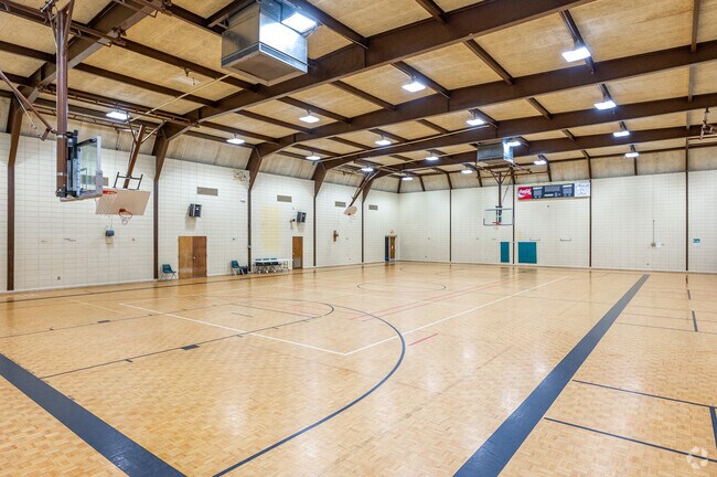 Locals can play a pickup game of basketball at the Warren Road Community Center in Westside.