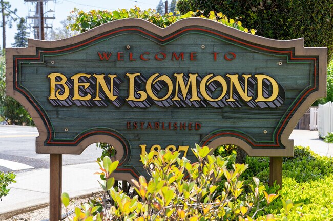 The rustic welcome sign marks entry into Ben Lomond, a mountain town established in 1887 and known for its sunny valley, redwood forests, and easygoing Santa Cruz Mountain lifestyle.