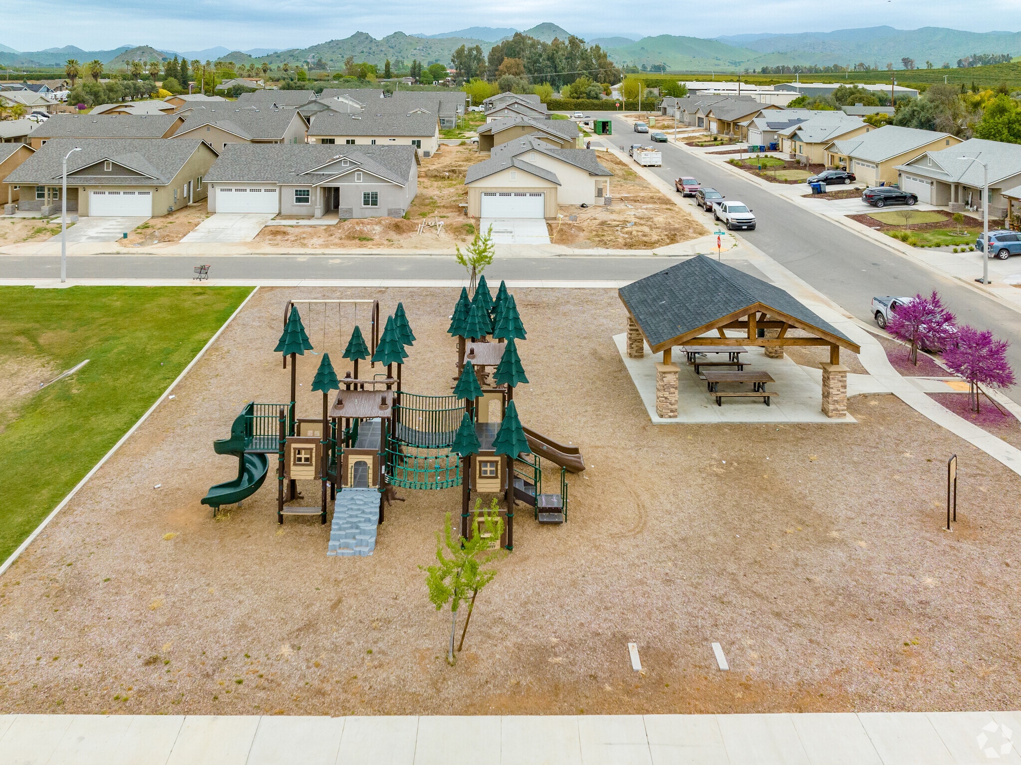 Children in Woodlake enjoy playing in the new play area at Valencia Heights Park.