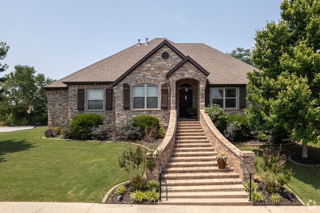 The stairs of this brick cottage flow to the street in the Copper Creek neighborhood.