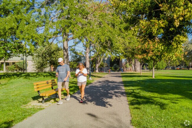 Residents can enjoy a shaded walking path at Rengstorff Park in Mountain View West.