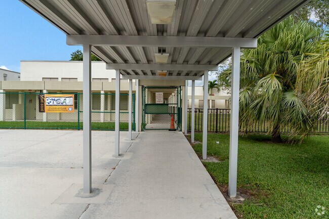 Entrances and hallways are covered at Calusa Elementary School in Miami, FL.