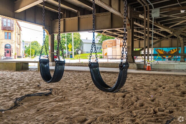 Swing park sits just across the river from Brewer's Hill.