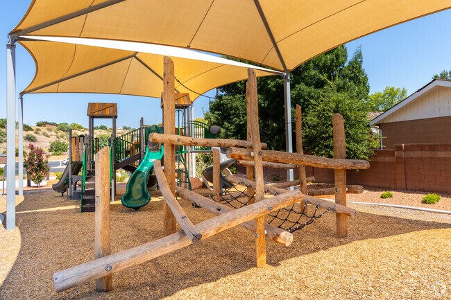 Swiss Pioneer Memorial Park hosts a wooden playground for families in Santa Clara Heights.