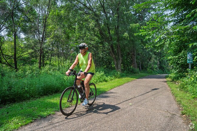 Residents can enjoy a bike ride along the Mississippi River Regional Trail.