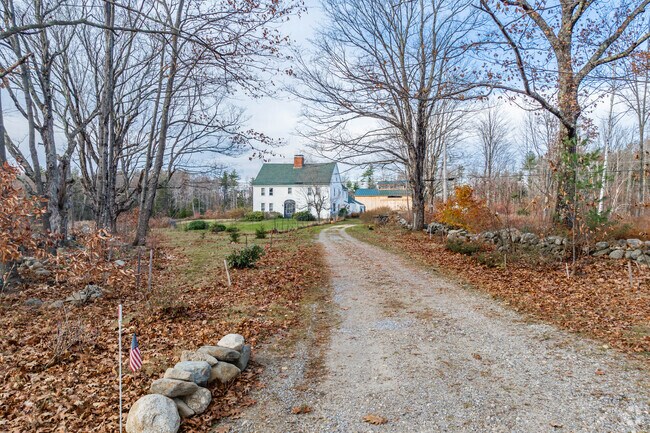 Many homes are set back from the road down gravel driveways in Deering.