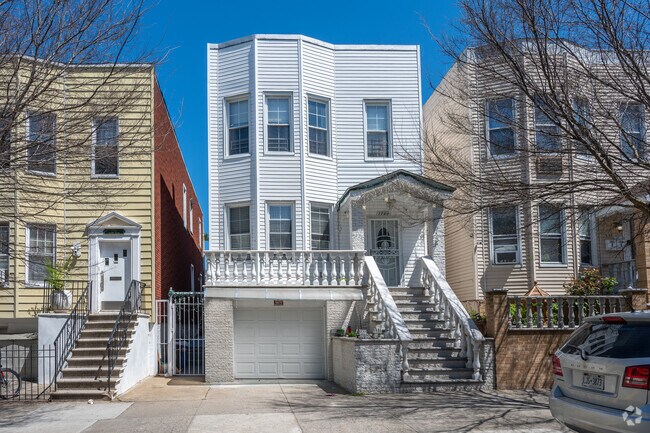 Detached homes with walk-up stairs and garages are also available in Van Nest.