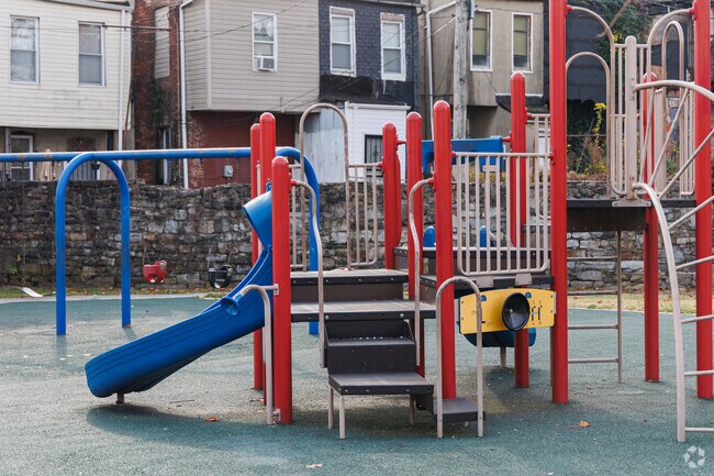 Warwick Avenue Park in Shipley Hill offers a fenced play area for kids and pets.