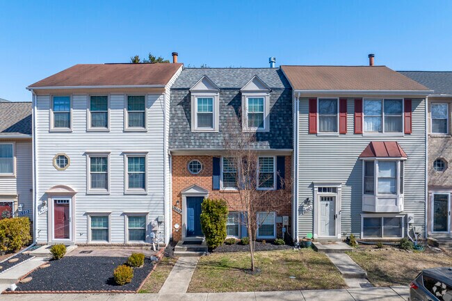 The town homes in Enfield Chase are made in different styles lending the neighborhood a charming vibe.