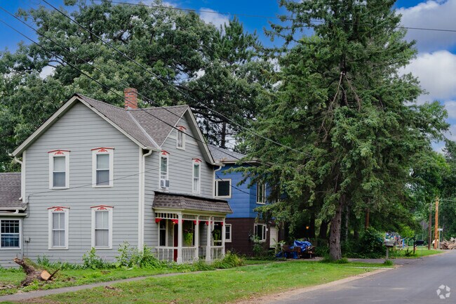 In Marine, many homes are surrounded by tall shady trees.