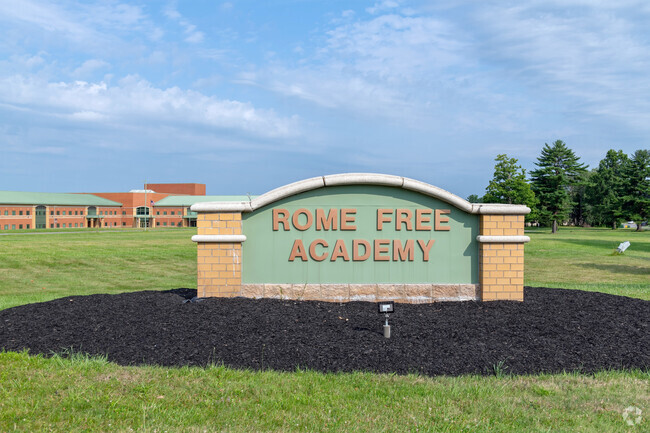The student attendance rate at Rome Free Academy is about 83%.