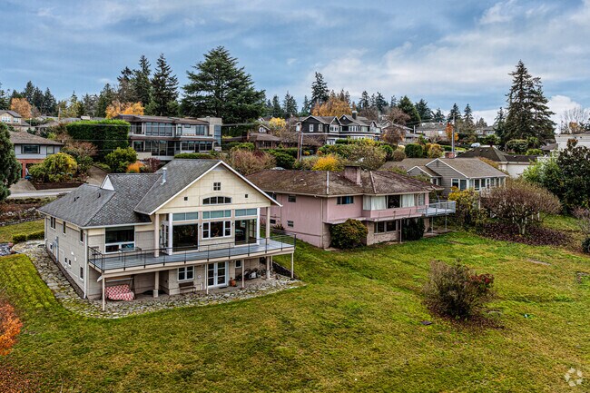 These homes share a backyard plot of land in the First Hill neighborhood.
