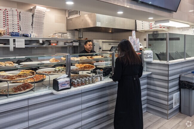 Grab a slice of pizza at Romeo's.