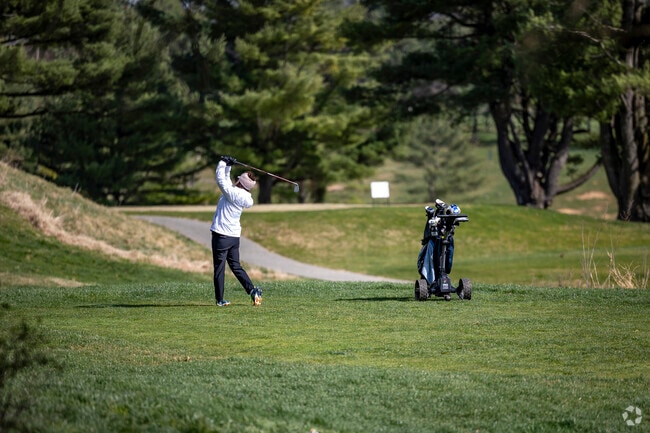 Practice your swing at the golf course in Derwood.