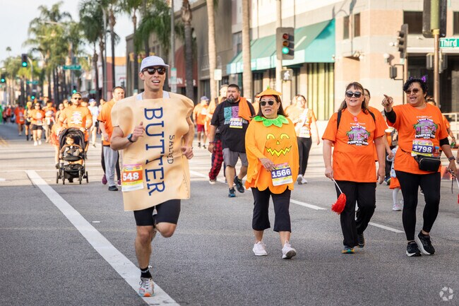 Many runners wear pumpkin-themed costumes at the Annual Alhambra Pumpkin Run.