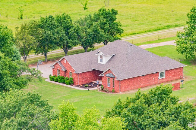Residents of Goldsby enjoy large homes surrounded by dense old growth trees.