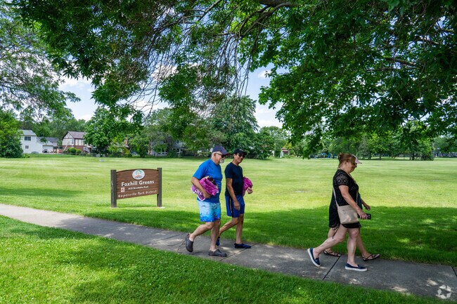 Naperville Residents enjoy a walk near Fox Hill Greens.