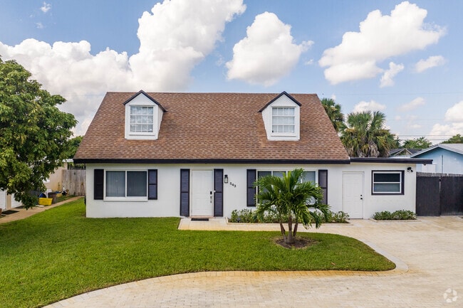 A beautiful side gabled craftsman style home in the Monet neighborhood.