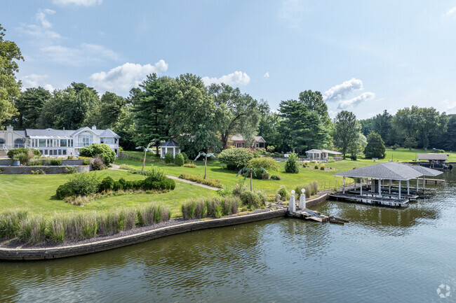Large lawns keep lake-side neighbors at a distance on the shores of Lake Springfield.