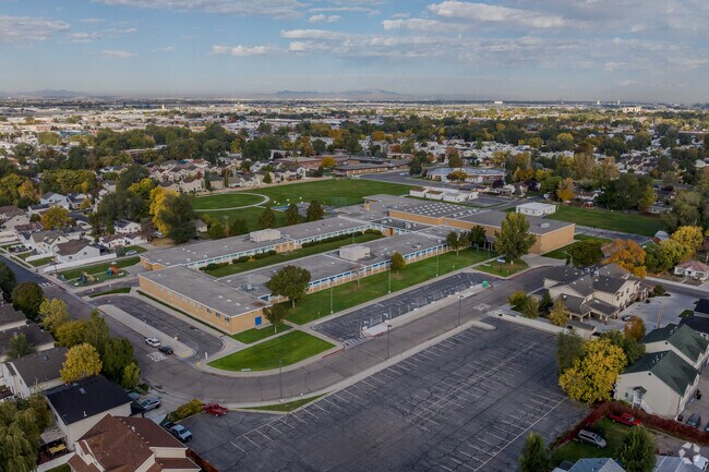 An aerial view of Lincoln Elementary shows a courtyard style layout of the school building.