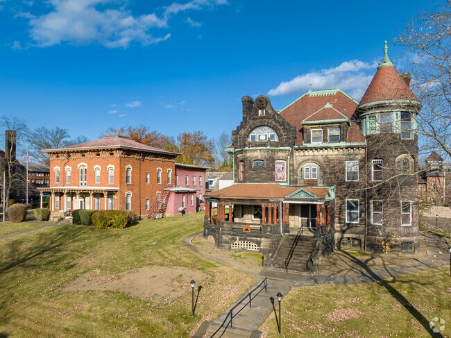 Large late 19th and early 20th century homes stand tall over Downtown Massillon.