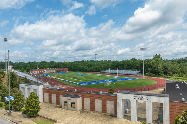 Mortimer Jordan High School colors are white and blue.