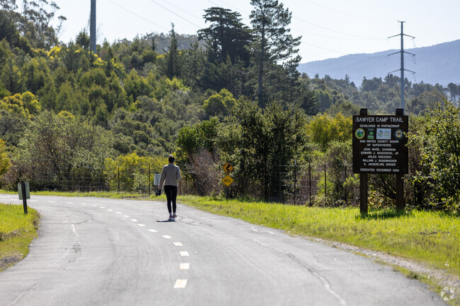 A man walks the Sawyer Camp Trail near Telescope Hills in Millbrae.