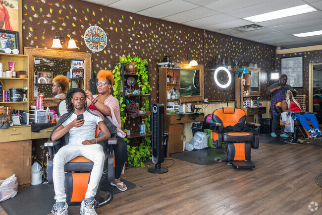River Pointe Plantation get their braids done at Ethnic Shynes.