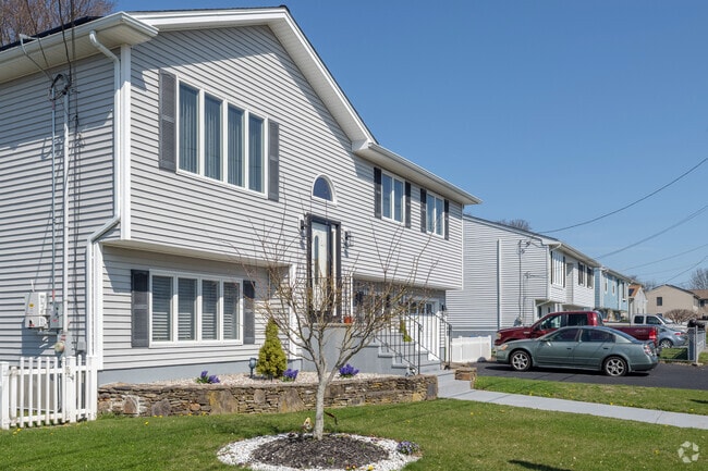 Many newer homes are a traditional raised-ranch style in the Sandy Beach neighborhood.