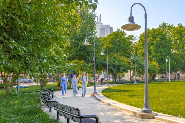 Relax and unwind at Amistad Park in The Hill, surrounded by greenery.