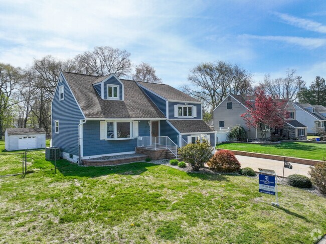 The homes in Spotswood from the mid 1900's feature large front lawns.