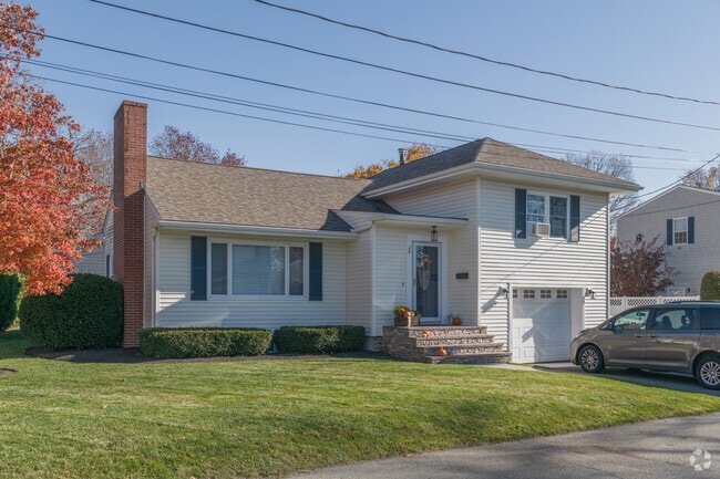 A split level house with a wonderful view makes the Acushnet / Pine Hill neighborhood home.